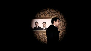 Movie still from “Mirrors - Into The Heart” (2011), directed by Us – Medium shot, High angle