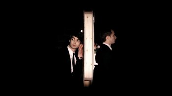 Movie still from “Mirrors - Into The Heart” (2011), directed by Us – Medium shot, Overhead angle