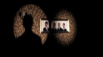 Movie still from “Mirrors - Into The Heart” (2011), directed by Us – Medium shot, Overhead angle