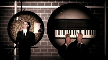 Movie still from “Mirrors - Into The Heart” (2011), directed by Us – Medium shot, Overhead angle