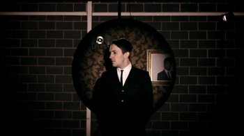 Movie still from “Mirrors - Into The Heart” (2011), directed by Us – Medium shot, Low angle