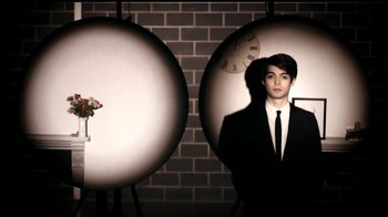 Movie still from “Mirrors - Into The Heart” (2011), directed by Us – Medium shot, Overhead angle