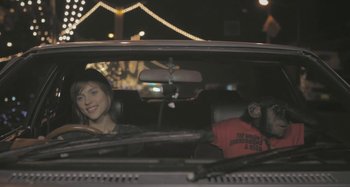 Movie still from “Bag Raiders - Sunlight” (2010), directed by Manu Cossu – Medium shot, Over the shoulder angle