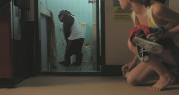 Movie still from “Bag Raiders - Sunlight” (2010), directed by Manu Cossu – Medium shot, Over the shoulder angle
