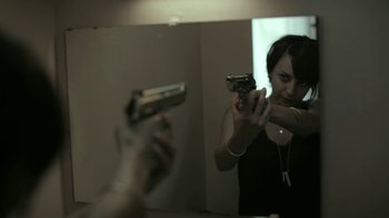 Movie still from “Tricky - Murder Weapon” (2010), directed by Manu Cossu – Medium shot, Low angle