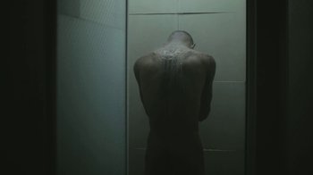 Movie still from “Tricky - Murder Weapon” (2010), directed by Manu Cossu – Medium shot, Overhead angle