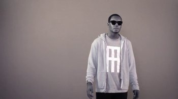 Movie still from “Dels - Trumpalump” (2010), directed by Us – Medium shot, Low angle