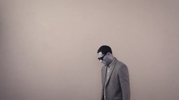 Movie still from “Dels - Trumpalump” (2010), directed by Us – Medium shot, Low angle