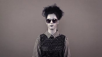 Movie still from “Dels - Trumpalump” (2010), directed by Us – Medium shot, Low angle