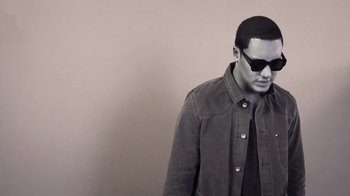 Movie still from “Dels - Trumpalump” (2010), directed by Us – Close Up shot, Low angle