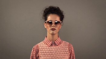 Movie still from “Dels - Trumpalump” (2010), directed by Us – Close Up shot, Low angle