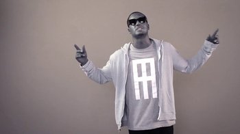 Movie still from “Dels - Trumpalump” (2010), directed by Us – Medium shot, Low angle