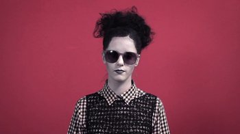 Movie still from “Dels - Trumpalump” (2010), directed by Us – Medium shot, Low angle