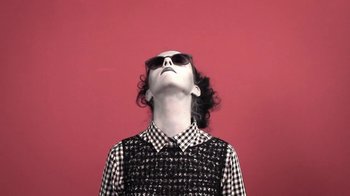 Movie still from “Dels - Trumpalump” (2010), directed by Us – Medium shot, Low angle