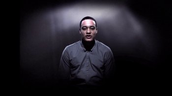 Movie still from “Dels - Shapeshift” (2010), directed by Us – Close Up shot, Low angle