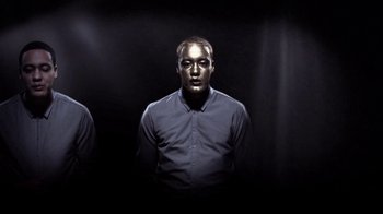 Movie still from “Dels - Shapeshift” (2010), directed by Us – Medium shot, Low angle