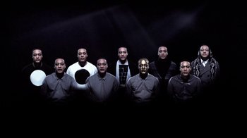 Movie still from “Dels - Shapeshift” (2010), directed by Us – Wide shot, Overhead angle