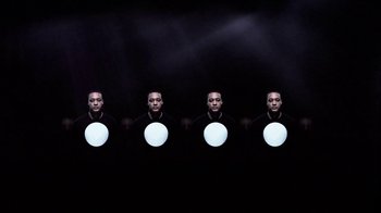 Movie still from “Dels - Shapeshift” (2010), directed by Us – Wide shot, Overhead angle