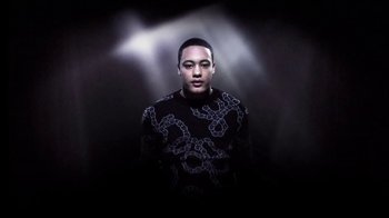 Movie still from “Dels - Shapeshift” (2010), directed by Us – Medium shot, Low angle