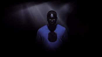 Movie still from “Dels - Shapeshift” (2010), directed by Us – Medium shot, Low angle