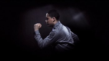 Movie still from “Dels - Shapeshift” (2010), directed by Us – Medium shot, Low angle