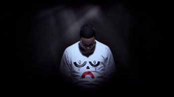 Movie still from “Dels - Shapeshift” (2010), directed by Us – Medium shot, Low angle