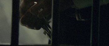 Movie still from “Plan B - Prayin” (2010), directed by Daniel Wolfe – Extreme Close Up shot, High angle