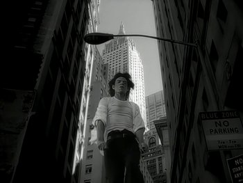 Movie still from “The Rolling Stones - Love Is Strong” (1994), directed by David Fincher – Wide shot, Low angle