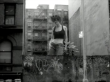 Movie still from “The Rolling Stones - Love Is Strong” (1994), directed by David Fincher – Medium shot, Low angle