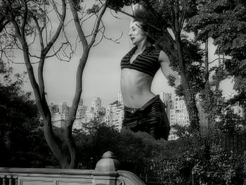 Movie still from “The Rolling Stones - Love Is Strong” (1994), directed by David Fincher – Wide shot, Low angle