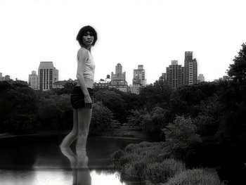 Movie still from “The Rolling Stones - Love Is Strong” (1994), directed by David Fincher – Wide shot, Low angle