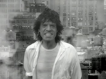 Movie still from “The Rolling Stones - Love Is Strong” (1994), directed by David Fincher – Close Up shot, Low angle