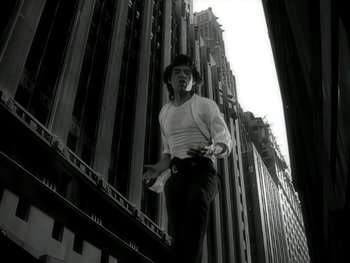 Movie still from “The Rolling Stones - Love Is Strong” (1994), directed by David Fincher – Medium shot, Low angle