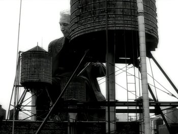 Movie still from “The Rolling Stones - Love Is Strong” (1994), directed by David Fincher – Wide shot, Low angle