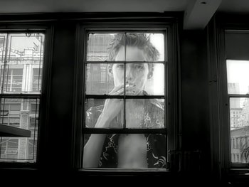 Movie still from “The Rolling Stones - Love Is Strong” (1994), directed by David Fincher – Medium shot, Low angle