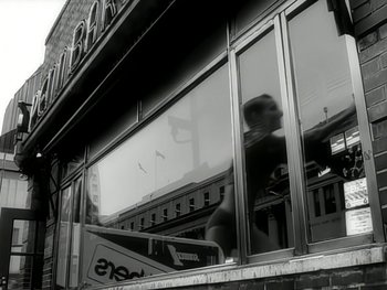 Movie still from “The Rolling Stones - Love Is Strong” (1994), directed by David Fincher – Wide shot, Low angle