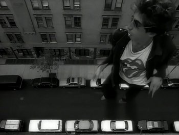 Movie still from “The Rolling Stones - Love Is Strong” (1994), directed by David Fincher – Wide shot, Overhead angle