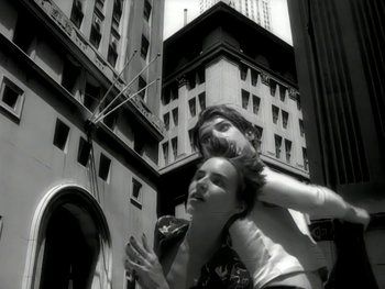 Movie still from “The Rolling Stones - Love Is Strong” (1994), directed by David Fincher – Medium shot, Low angle