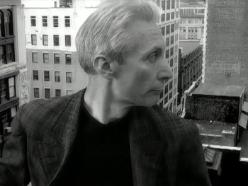 Movie still from “The Rolling Stones - Love Is Strong” (1994), directed by David Fincher – Close Up shot, Low angle