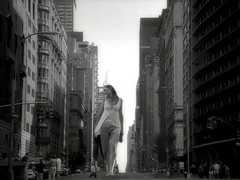 Movie still from “The Rolling Stones - Love Is Strong” (1994), directed by David Fincher – Wide shot, Low angle