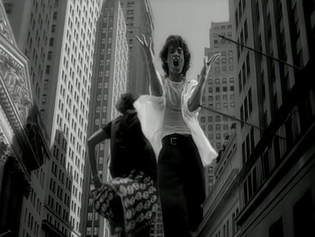 Movie still from “The Rolling Stones - Love Is Strong” (1994), directed by David Fincher – Medium shot, Low angle