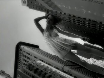 Movie still from “The Rolling Stones - Love Is Strong” (1994), directed by David Fincher – Wide shot, Low angle