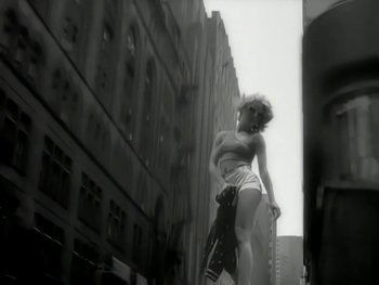 Movie still from “The Rolling Stones - Love Is Strong” (1994), directed by David Fincher – Medium shot, Low angle