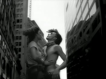 Movie still from “The Rolling Stones - Love Is Strong” (1994), directed by David Fincher – Medium shot, Low angle