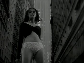 Movie still from “The Rolling Stones - Love Is Strong” (1994), directed by David Fincher – Medium shot, Low angle