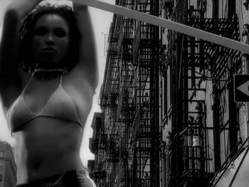 Movie still from “The Rolling Stones - Love Is Strong” (1994), directed by David Fincher – Medium shot, Low angle