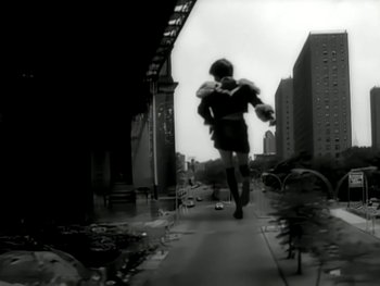 Movie still from “The Rolling Stones - Love Is Strong” (1994), directed by David Fincher – Wide shot, Low angle