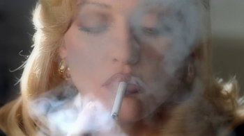 Movie still from “Madonna - Bad Girl” (1993), directed by David Fincher – Extreme Close Up shot, Overhead angle