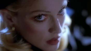 Movie still from “Madonna - Bad Girl” (1993), directed by David Fincher – Extreme Close Up shot, Overhead angle