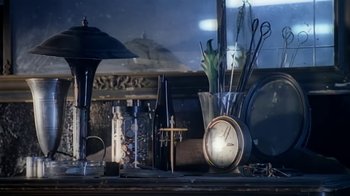 Movie still from “Madonna - Bad Girl” (1993), directed by David Fincher – Extreme Close Up shot, High angle